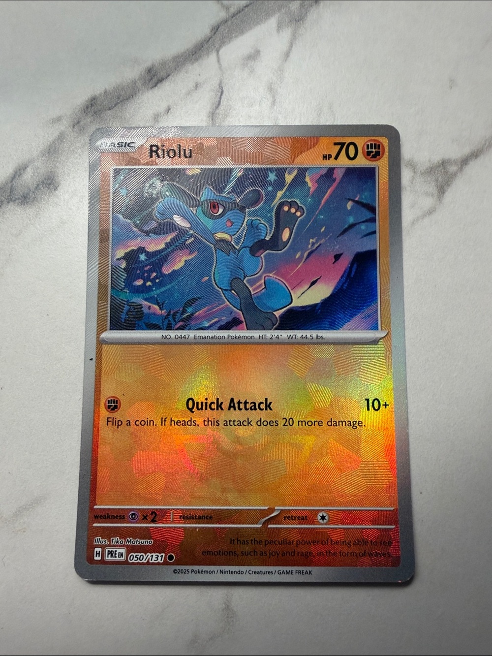Pokemon Riolu Holographic Card rare poke ball. Prismatic evolutions Pokemon
